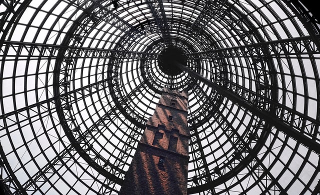 Low angle photography of black metal framed tower